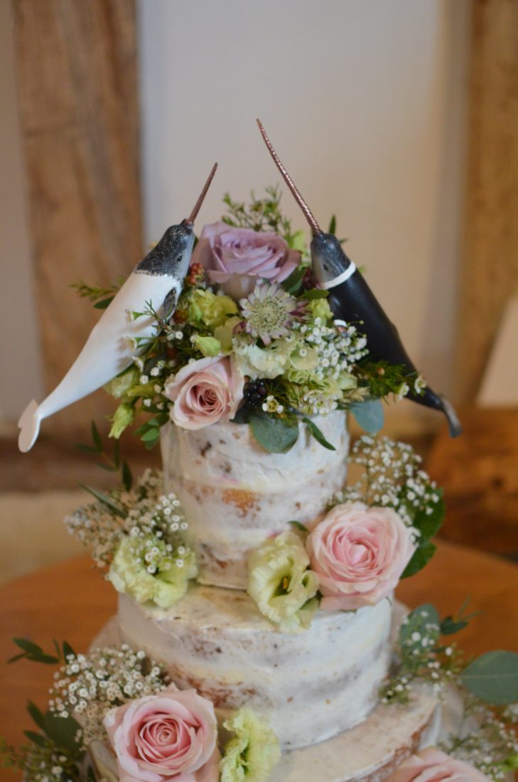 Narwhal cake toppers on Semi-Naked wedding cake Hampshire