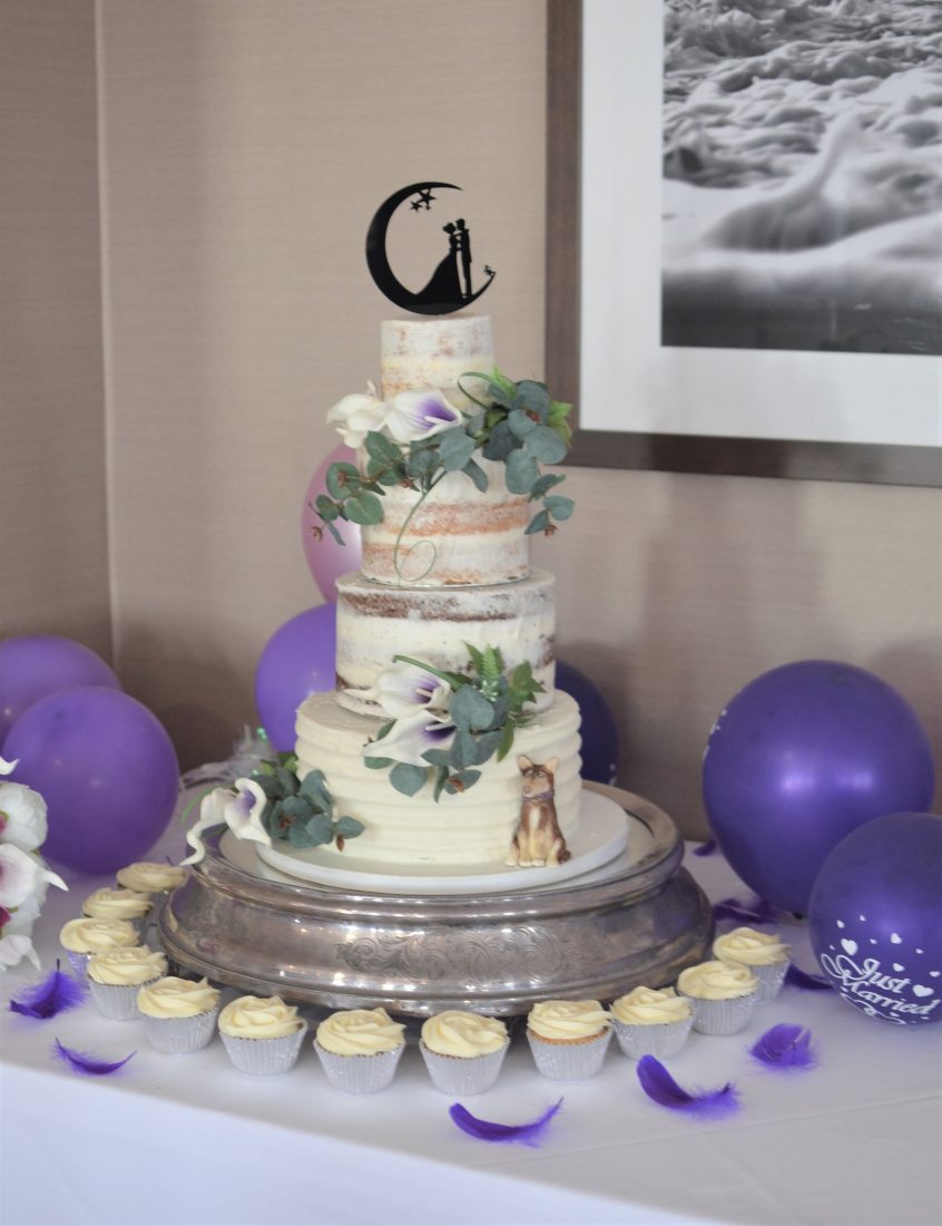 Part semi-naked wedding cake with handmade sugar pet dog and Gluten free cupcakes.The Carlton Hotel