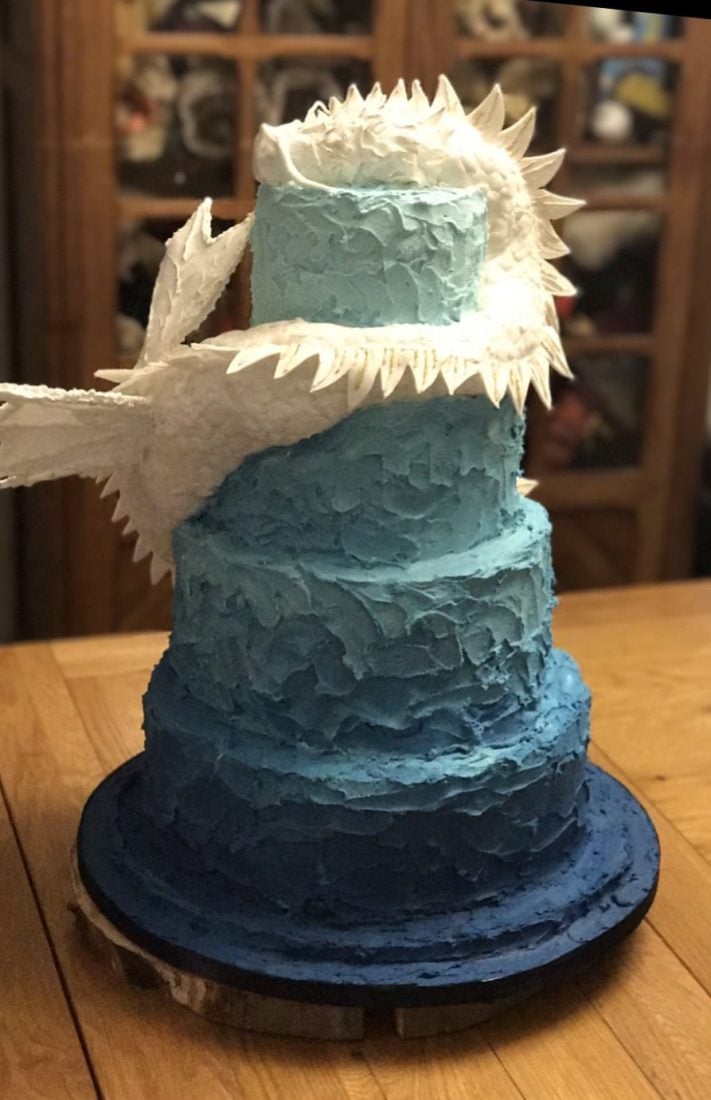 Back view of Dragon cake with ombre buttercream.