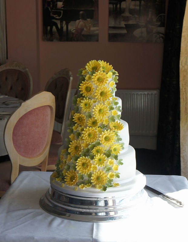 Yellow daisies wedding cake at The Dudsbury