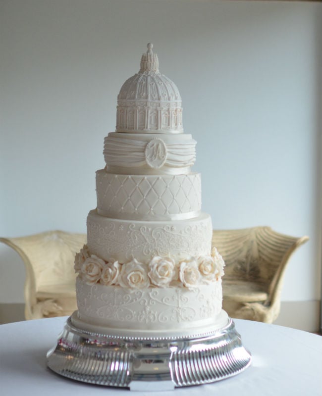 Elegant ivory wedding cake at The Italian Villa.