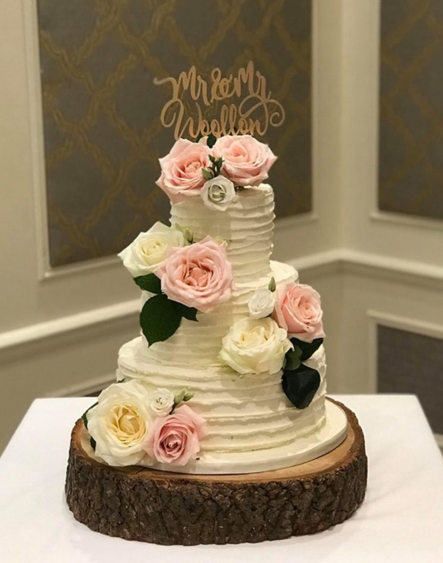 Buttercream coated wedding cake flowers by Landsdown Florist at The Marriot Hotel