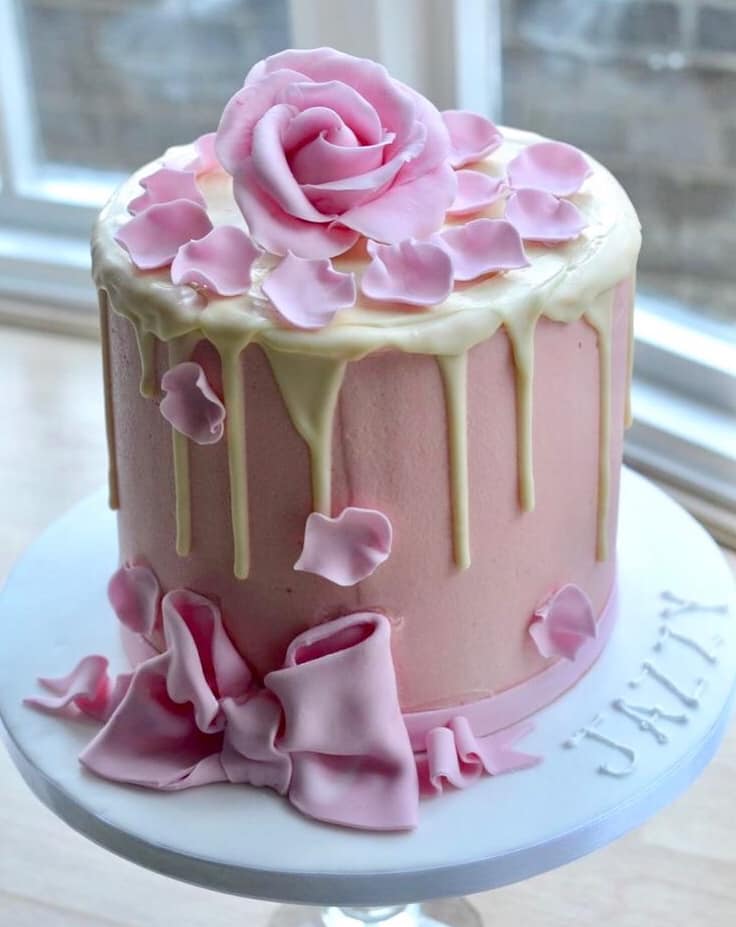Pink bow & rose drip cake