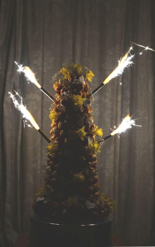 Croquembouche lit with fountain candles
