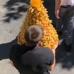 My son taking responsibility of the croquembouche for the first time. He said he felt he was holding the full weight of the world in his hands.