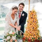 Beautiful couple with their croquembouche! Piece montee