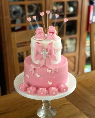 Pink booties Christening cake